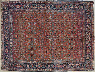 an antique persian rug with a red and blue border