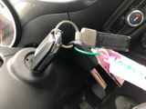 a car key with a tag attached to it
