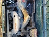 a box with tools in it sitting on the floor
