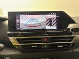 the dashboard of a car with a display of a camera