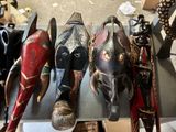 a lot of masks that are sitting on a table
