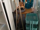 a lot of cleaning supplies on the floor in this room