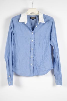 the shirt is blue and white with a white collar