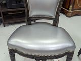 a chair that is sitting in the middle of a room