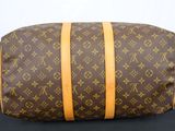 a louis vuittou toilet bag on a black surface