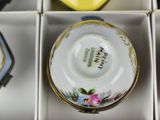 a white box with a tea cup and saucer in it