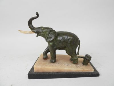statue of an elephant and a baby elephant on a marble base