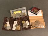 a lot of coins that are sitting in a wallet