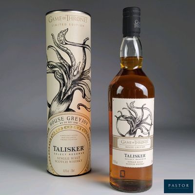 an image of a bottle of whisky next to a cardboard box