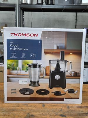 a box that has a blender on it on a table