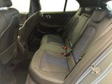 the back seats of a car with a seat belt in a car