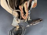 a bag that has a pair of scissors in it
