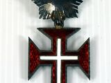 a red, yellow, and blue medal with a cross on it