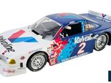 the toy car is blue and white with a red, white, and blue design on it