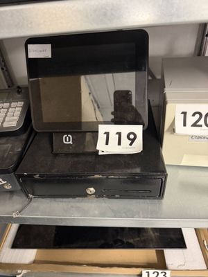 a lot of electronic devices on the shelves in the store