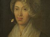 un vieux tableau représentant une femme coiffée d'un bonnet, tenant un papillon dans la main