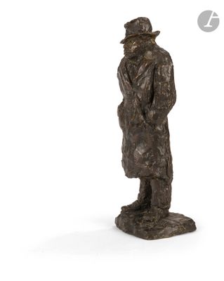 statue of a man in a hat and coat with a cane