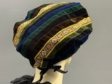 an image of a woman ' s hat on a mannequin head
