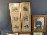 three framed pictures of men in military uniforms are on a table