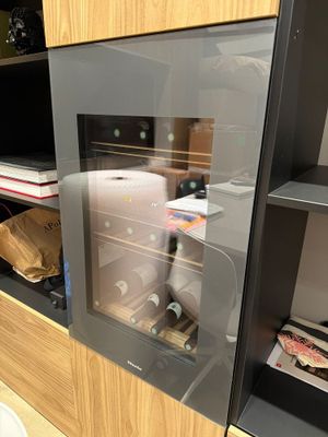 a microwave with a glass door in a kitchen