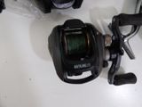 a fishing reel and a fishing line on a table