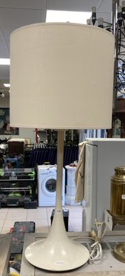 a lamp that is sitting on a table in a store