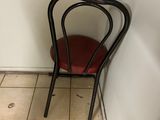 a chair that is sitting in the corner of a room