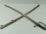 pair of two swords on a white surface with a white background