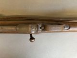 a gun that is sitting on top of a table