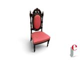 an image of a red chair with a black frame and a red seat