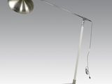 a close up of a lamp on a white surface with a gray background