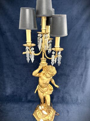gold plated candelabra with cherenal and crystal chandelier
