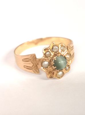 BAGUE en or rose 750 millièmes ornée de cabochon de chrysobé…