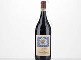 a bottle of red wine sitting on top of a table