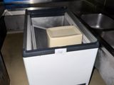 an image of a kitchen with a sink and a freezer