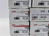 several boxes of mail are stacked on top of each other