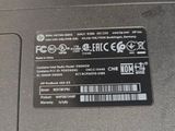 a close up of a laptop with a sticker on it