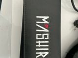 a black box with a black mouse and a black mouse