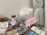a pile of assorted items sitting on a counter