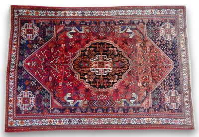 a close up of a rug on a white surface with a white background