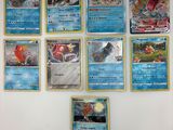 beaucoup de cartes pokemon sur le mur