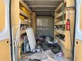 an image of a van with a lot of stuff inside of it