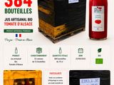 le site web d'une épicerie présentant une bouteille de vin et un carton de bouteilles