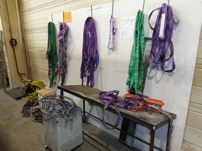 many different colored ribbons hanging on the wall
