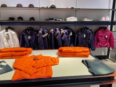 a table with a lot of clothes on it