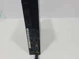an image of a small computer with a wifi router attached to it