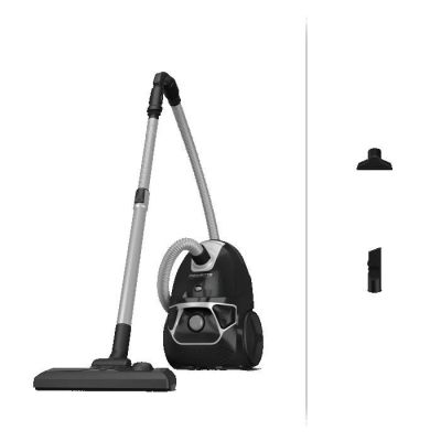 photo en noir et blanc représentant un vide et un aspirateur