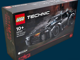 a box with a lego technic car inside of it
