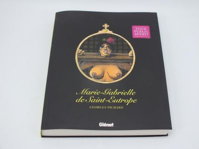 a black book with a picture of a woman in a mirror