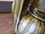 a vase that is sitting on a wooden table